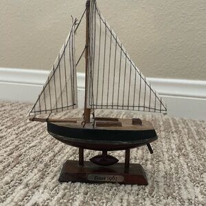 Wooden Sailboat Decor with Striped White Sails